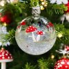 SKLENENÁ VIANOČNÁ OZDOBA - PRIEHĽADNÁ GUĽA S MUCHOTRÁVKAMI (6 CM)